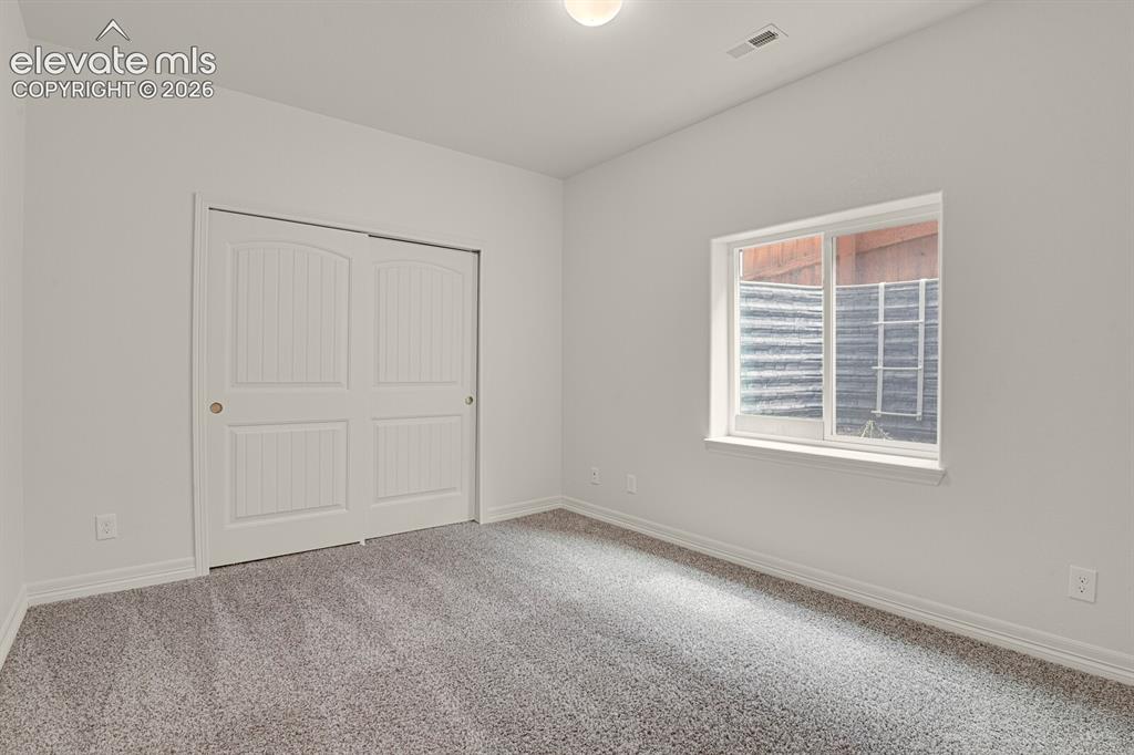Image 10 of 18: Bedroom