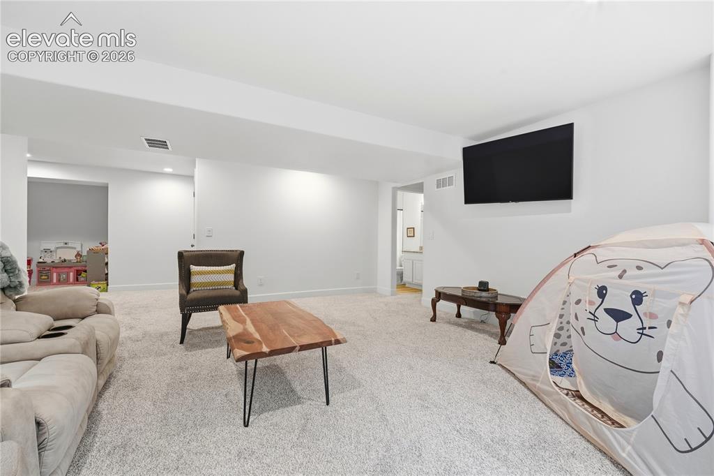 Image 33 of 50: Family Room in basement 