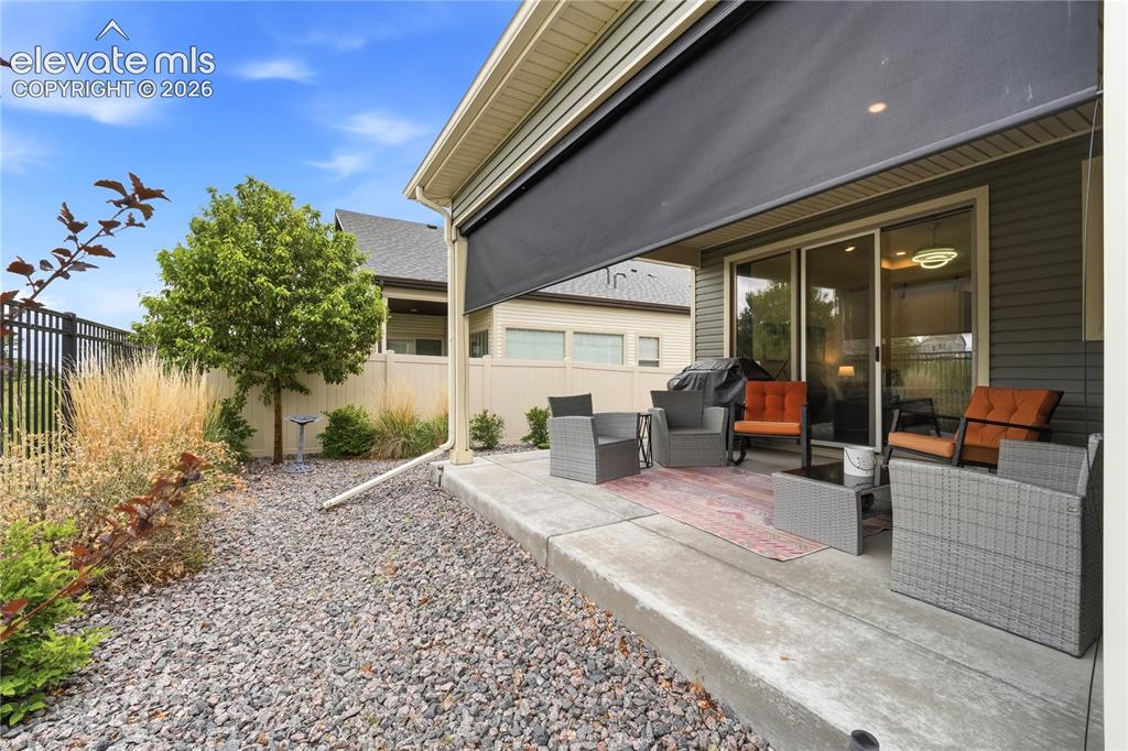 Image 8 of 50: Easy Xeriscaped yard.