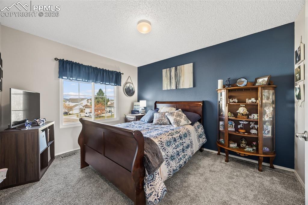 Image 28 of 35: Bedroom