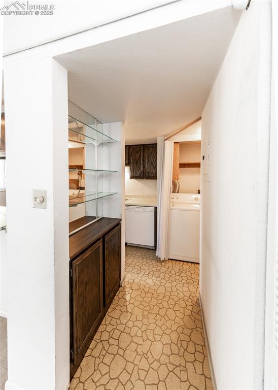 Image 19 of 40: Corridor with washer / clothes dryer