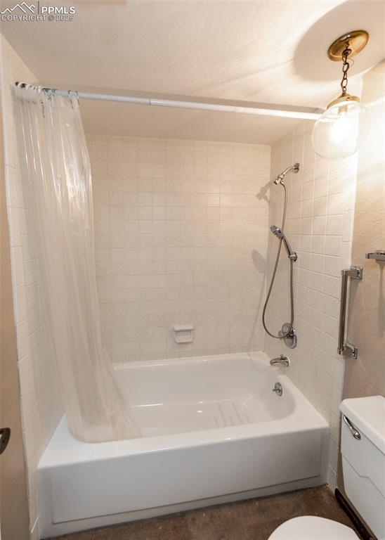 Image 23 of 40: Master Bathroom with shower / tub combo