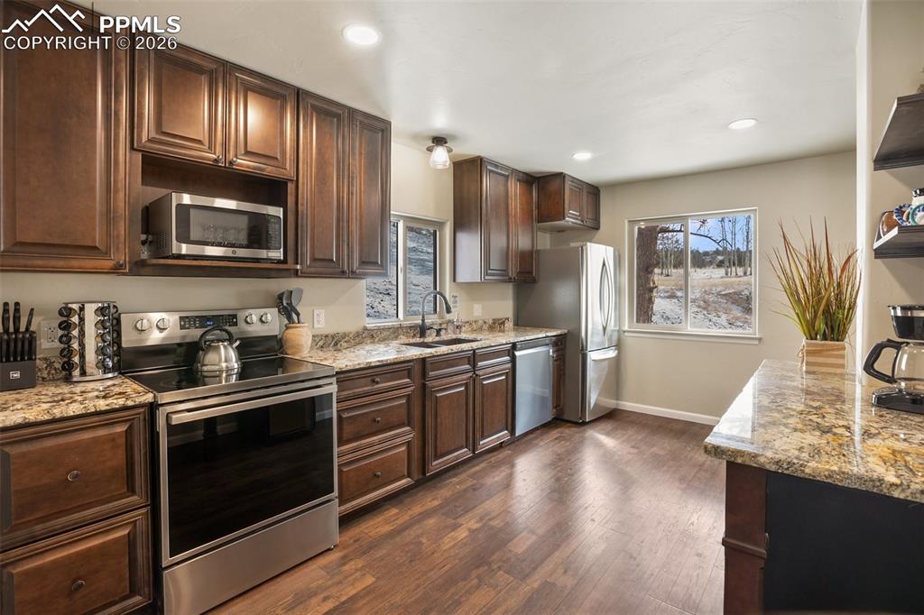 Image 10 of 38: Main level kitchen