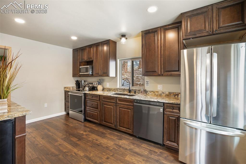 Image 11 of 38: Main level kitchen