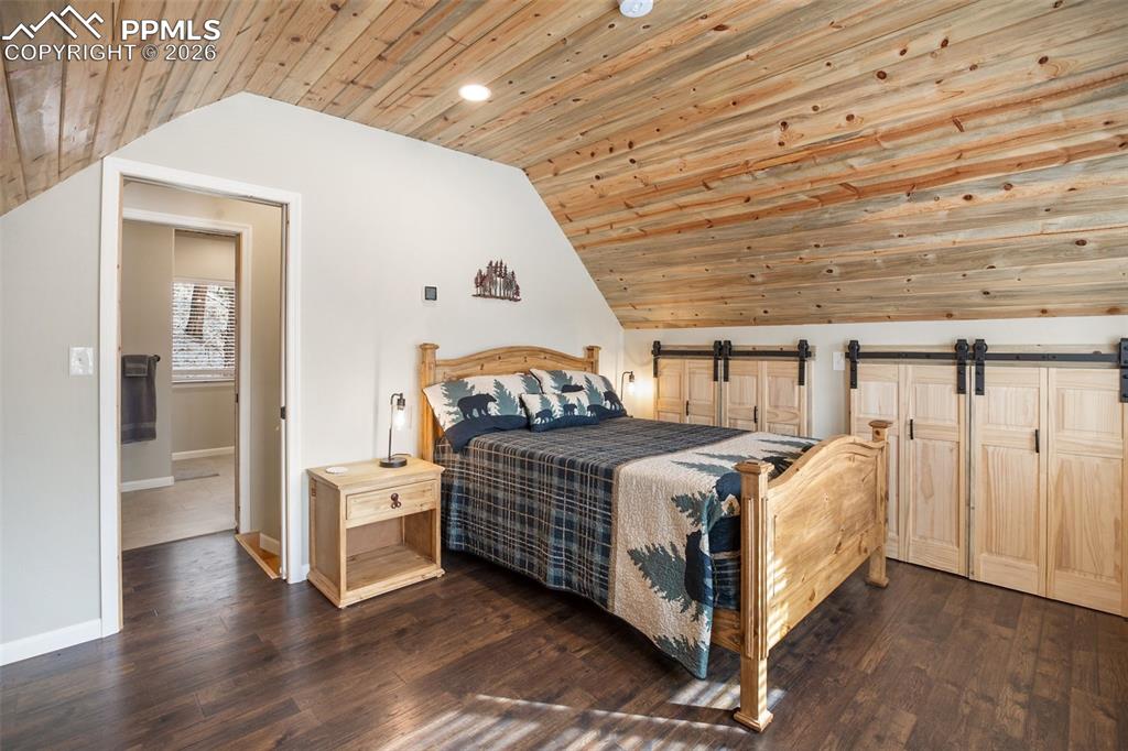 Image 14 of 38: Main level primary bedroom