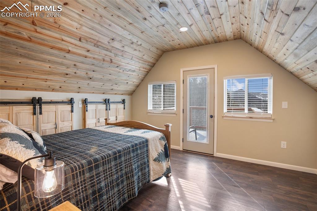 Image 15 of 38: Upper level primary bedroom 