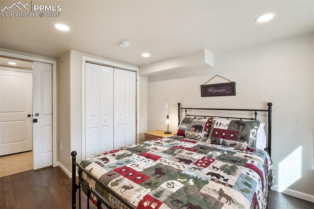 Image 21 of 38: Basement bedroom