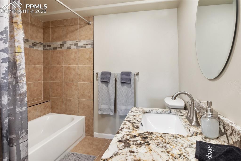 Image 22 of 38: Basement bathroom