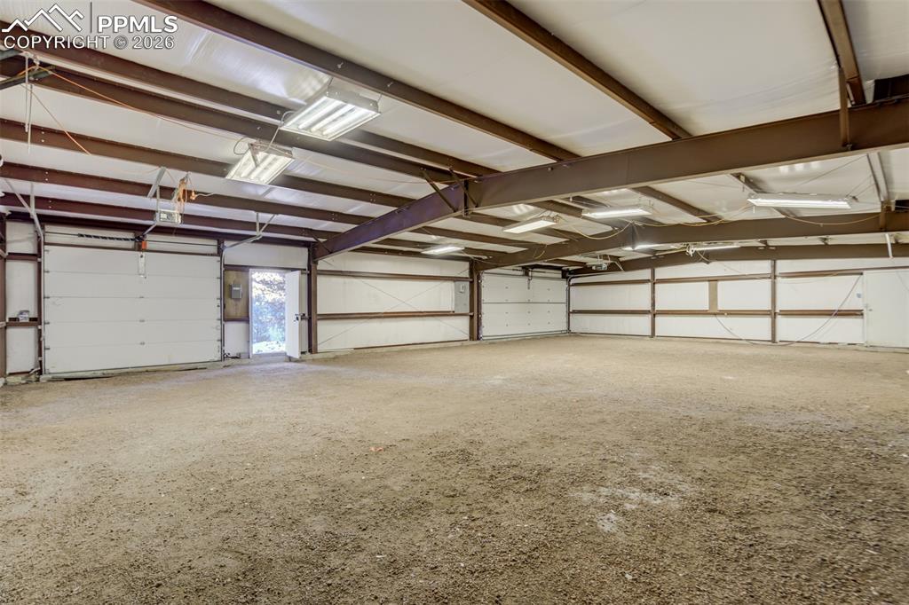 Image 4 of 38: 2400 sq ft detached garage with electrical and I beams