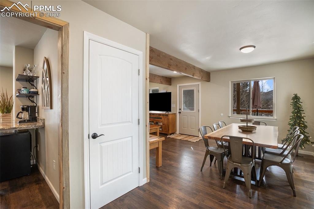 Image 9 of 38: Main level dining, living room and kitchen 