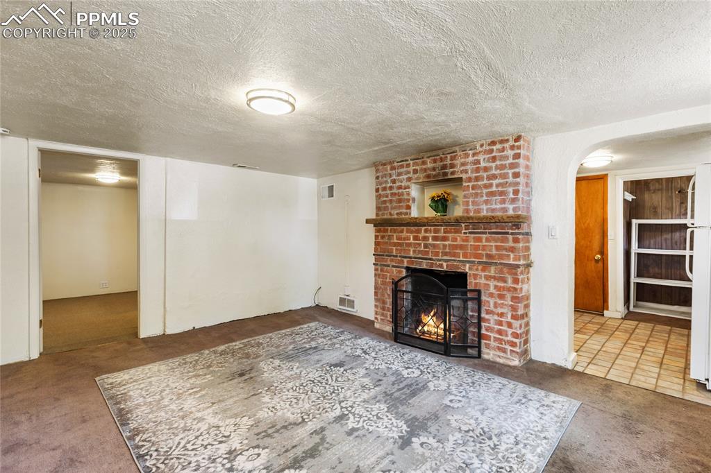 Image 22 of 34: Basement apartment living room