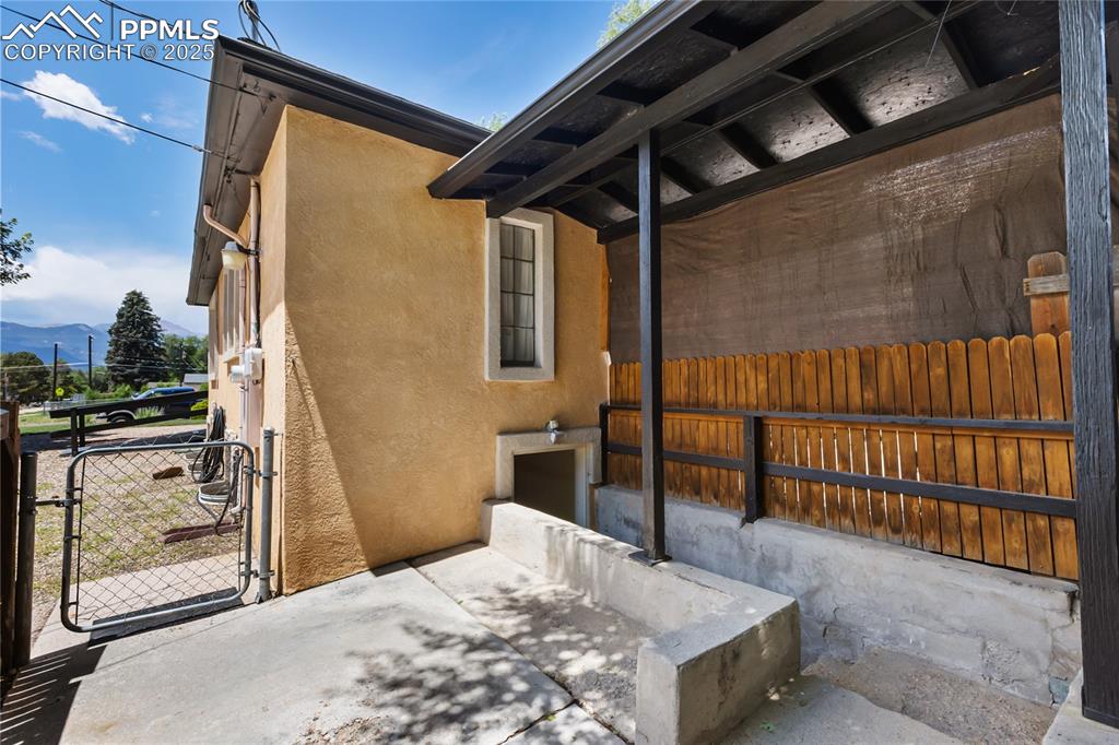 Image 31 of 34: Separate entrance to basement apartment.n