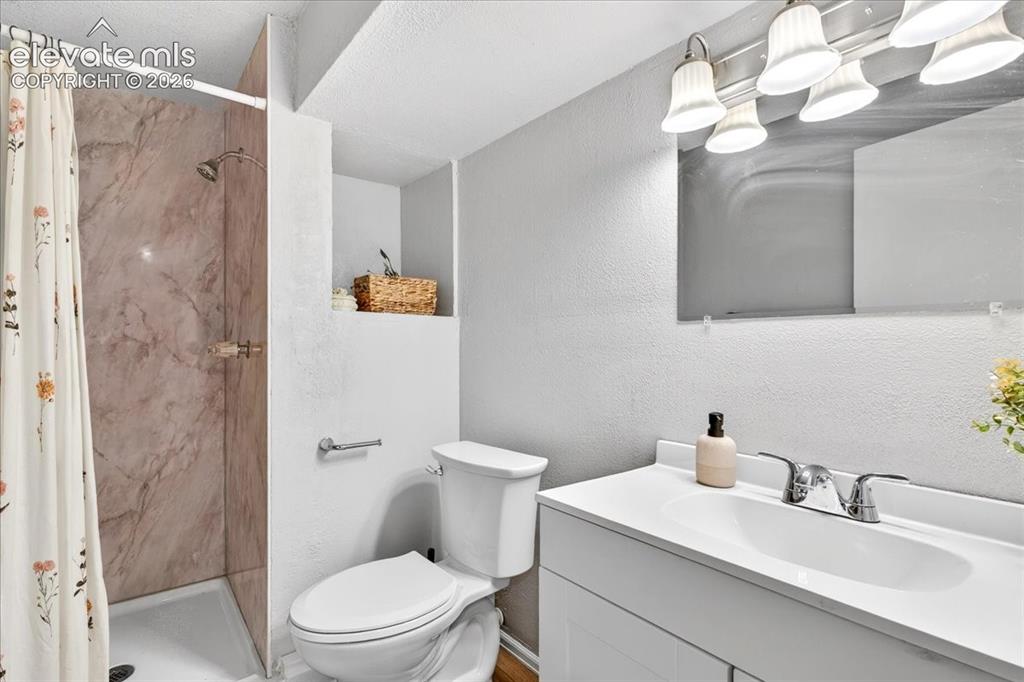 Image 28 of 39: basement bathroom