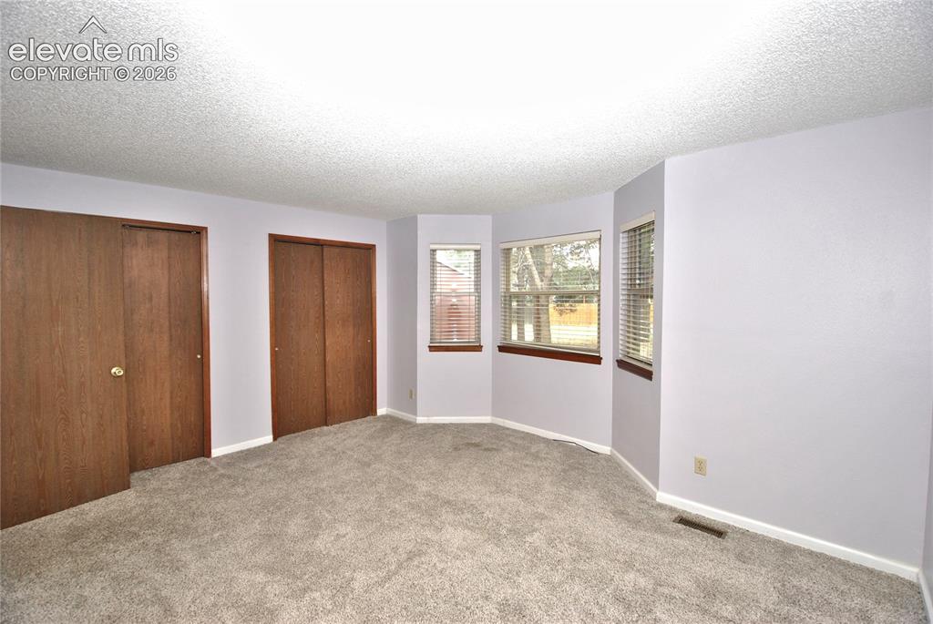 Image 12 of 23: Master Bedroom
