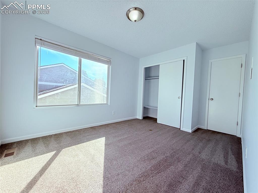 Image 30 of 39: Bedroom