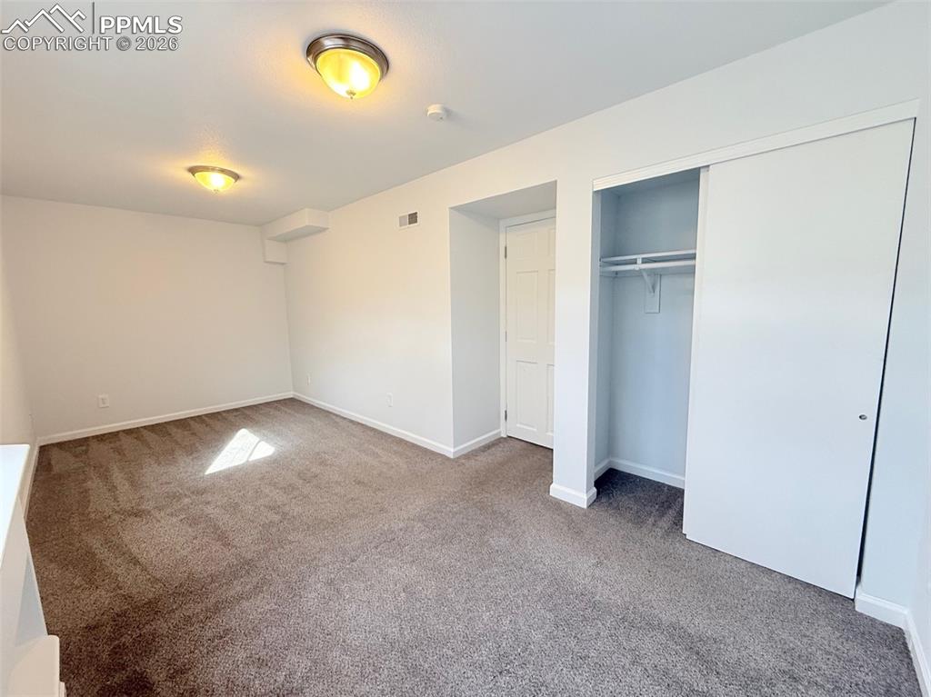 Image 33 of 39: Bedroom