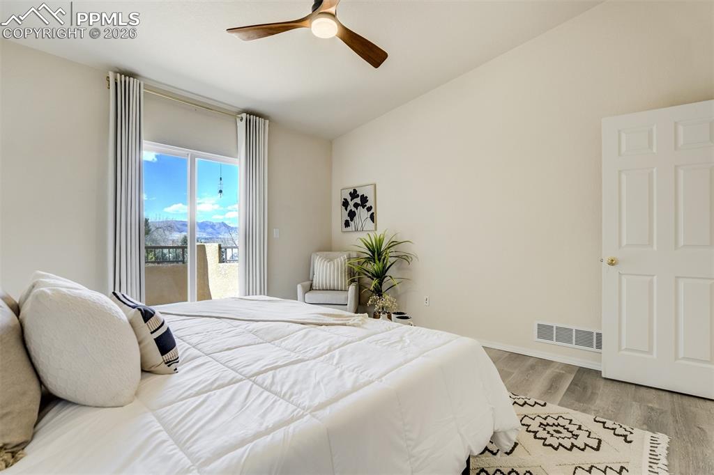 Image 18 of 39: Mountain views from the Primary bedroom. 