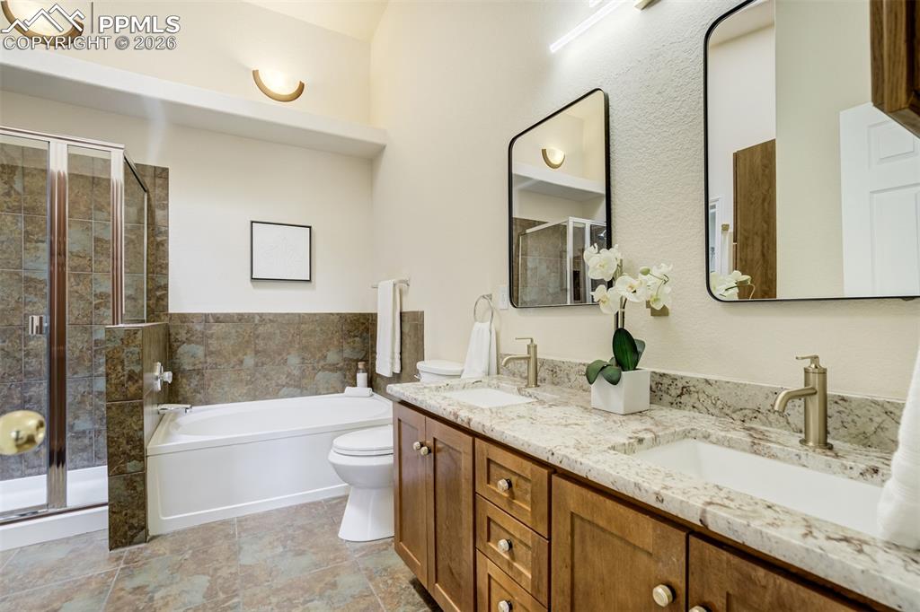 Image 21 of 39: All bathrooms have new granite as well.