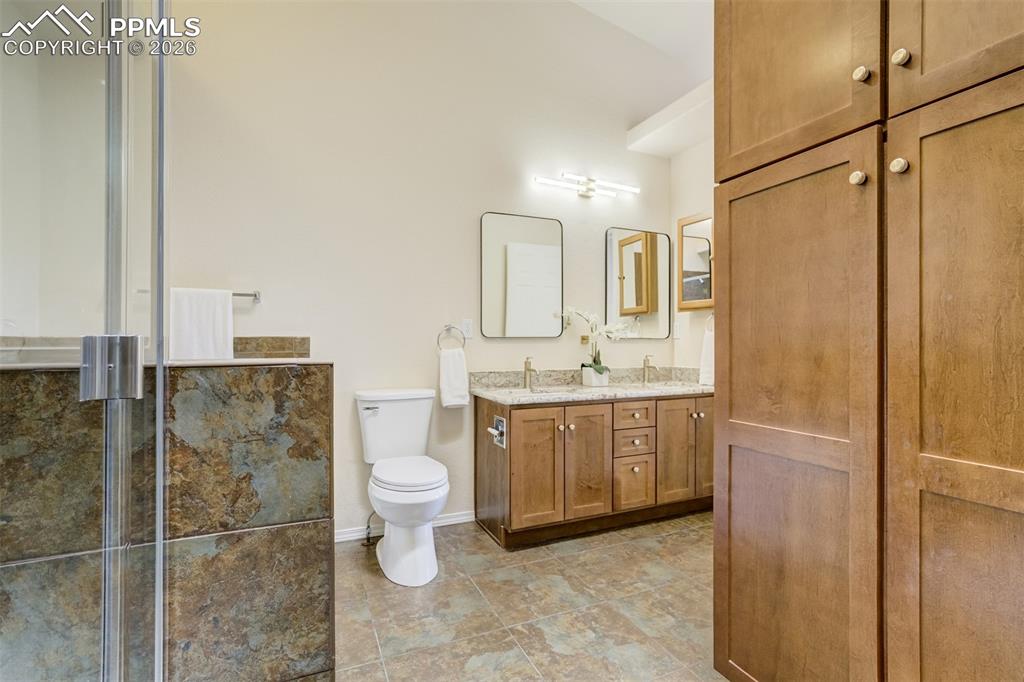 Image 23 of 39: Additional storage in the bathroom. 