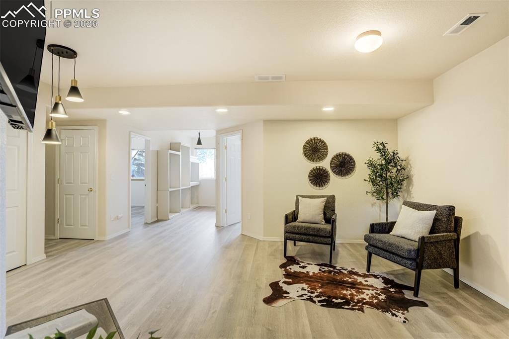 Image 26 of 39: Clean & bright basement with all new flooring.