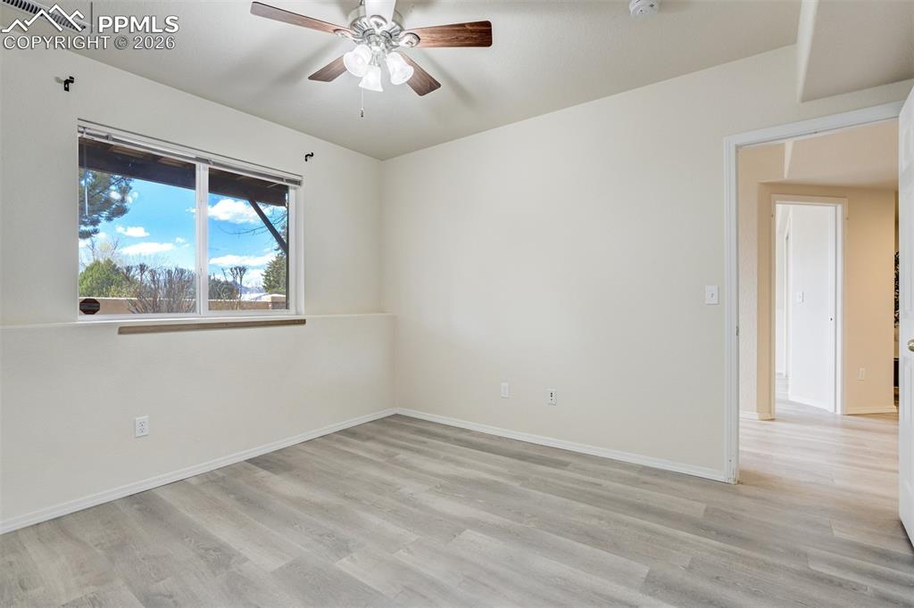 Image 30 of 39: Secondary bedroom in the basement.