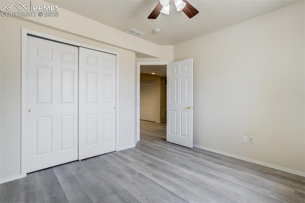 Image 32 of 39: Third bedroom in the basement.
