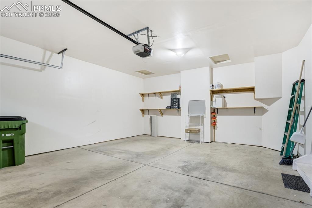 Image 36 of 39: Fully drywalled 2 car garage. 