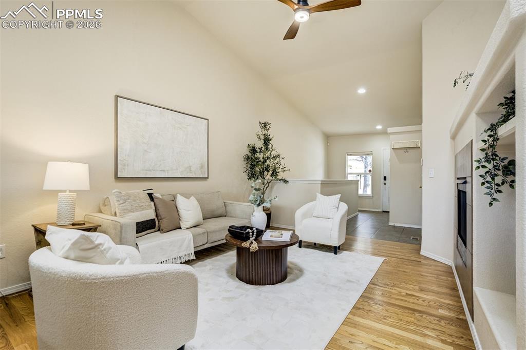 Image 4 of 39: Inviting space with Oakwood flooring in the living room.