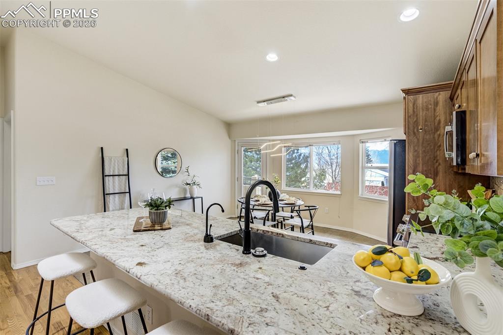 Image 8 of 39: Plenty of counter space to sit. 