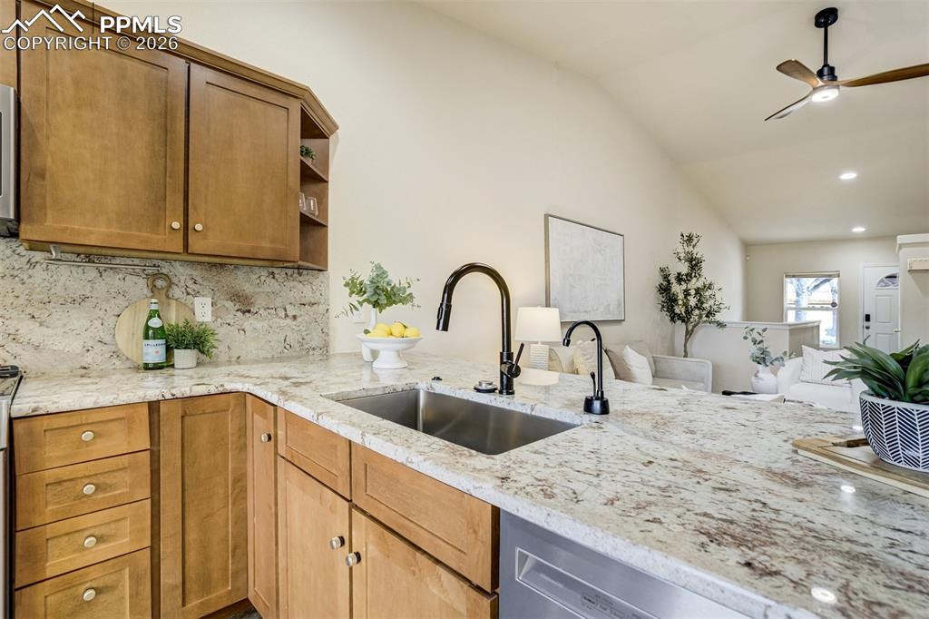 Image 9 of 39: Lovely open concept in the kitchen & living room. 
