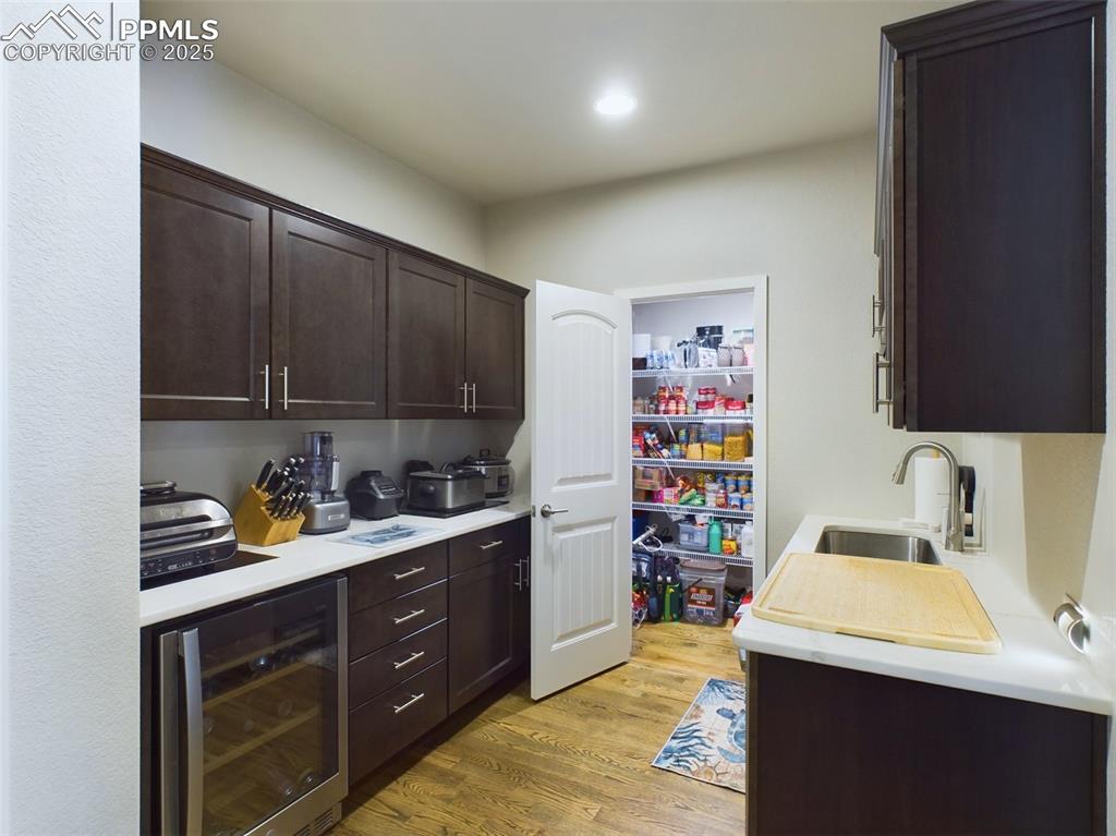 Image 4 of 40: Prep area w 2nd dishwasher  sink