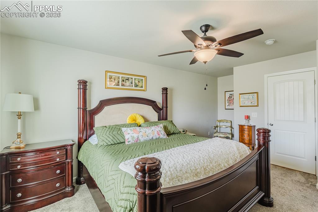 Image 12 of 26: Half bathroom with baseboards and dark wood finished floors