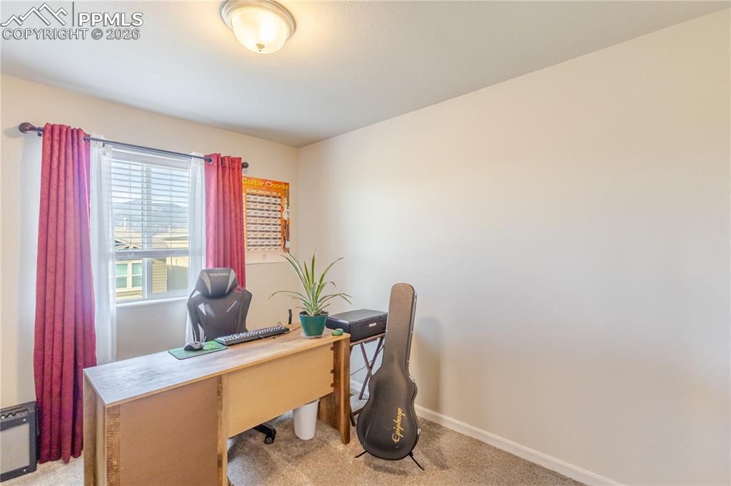 Image 17 of 26: Bedroom with ceiling fan