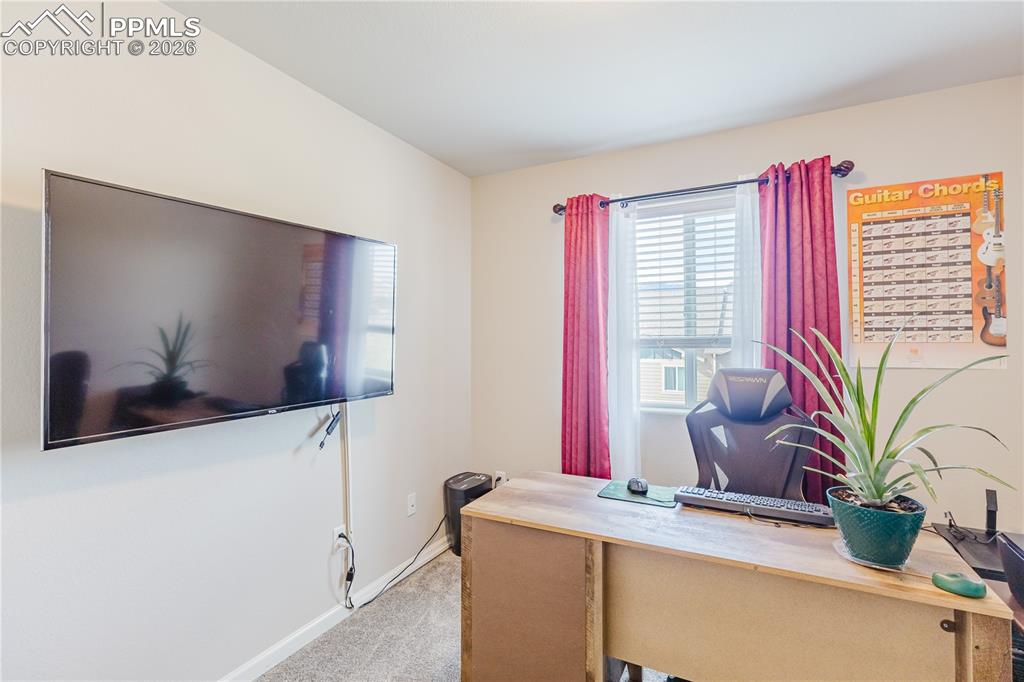 Image 18 of 26: Bathroom featuring vanity and a shower with curtain