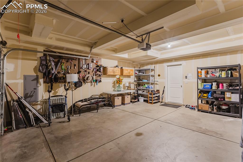 Image 19 of 26: Office area featuring light colored carpet
