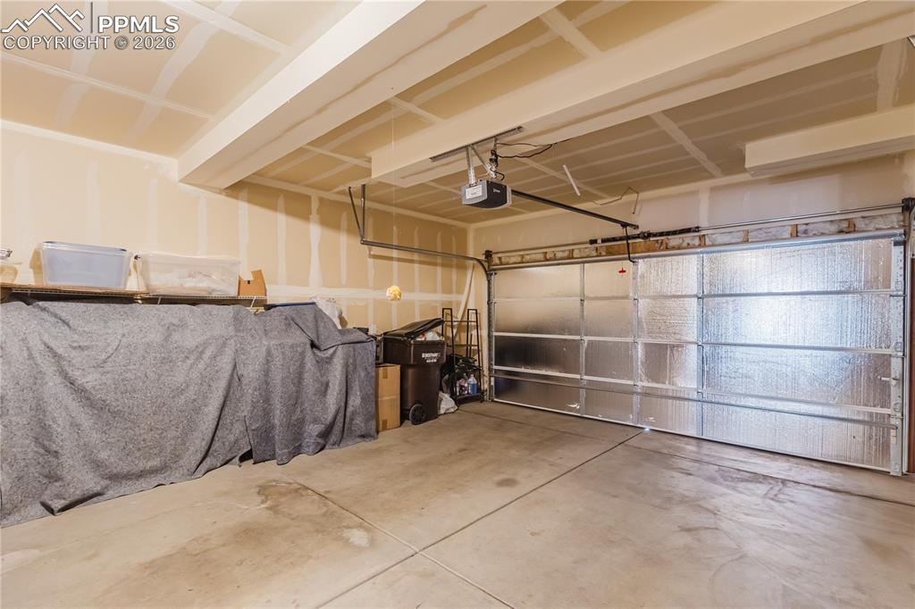 Image 20 of 26: Office featuring light colored carpet and baseboards