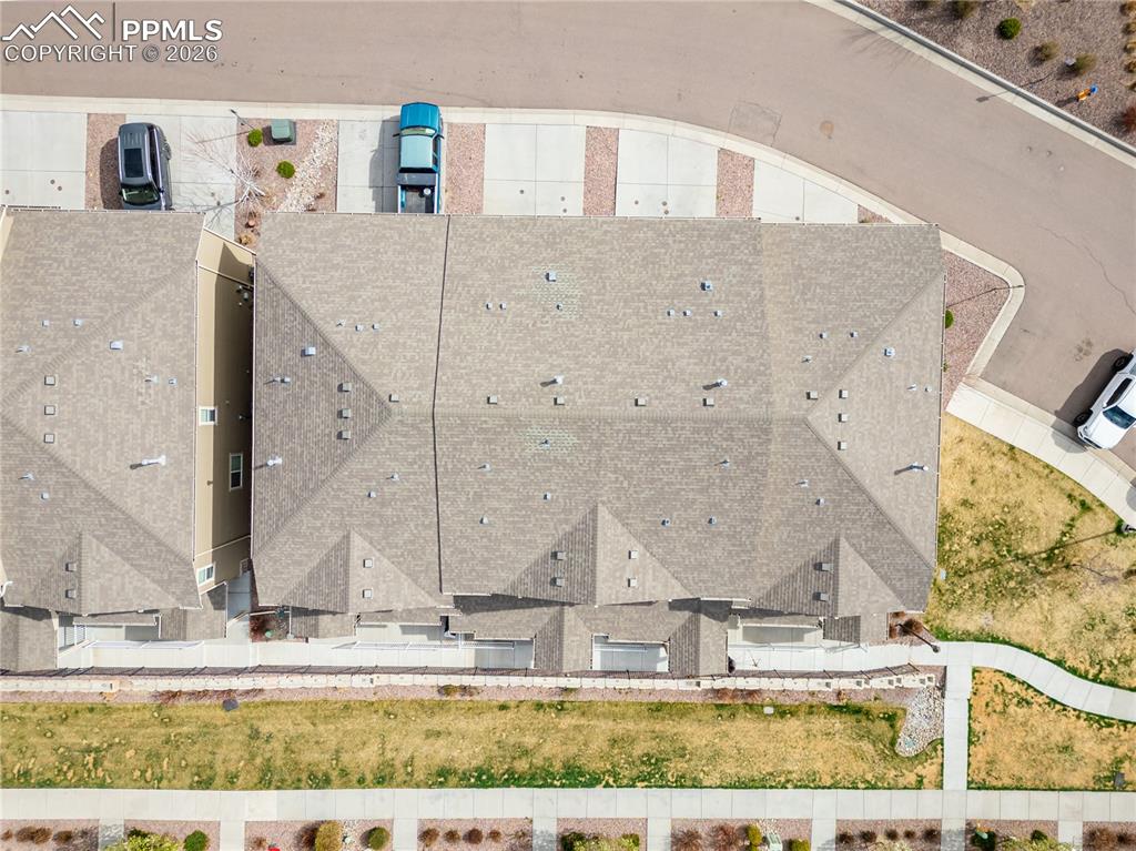 Image 21 of 26: Garage featuring electric panel