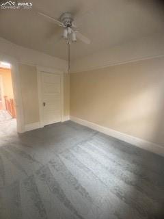 Image 16 of 50: Unfurnished bedroom with carpet and a ceiling fan