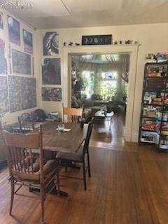 Image 29 of 50: Dining room featuring hardwood / wood-style flooring