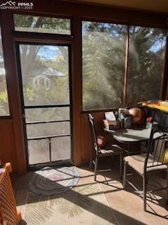 Image 40 of 50: Sunroom with healthy amount of natural light