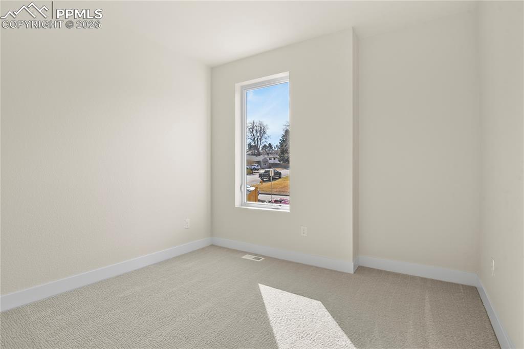 Image 21 of 33: Bedroom