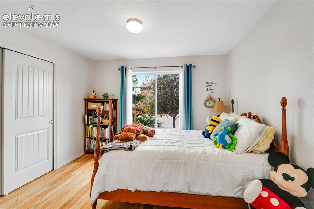 Image 27 of 46: Huge lower Family Room with plenty of natural light and high ceilings
