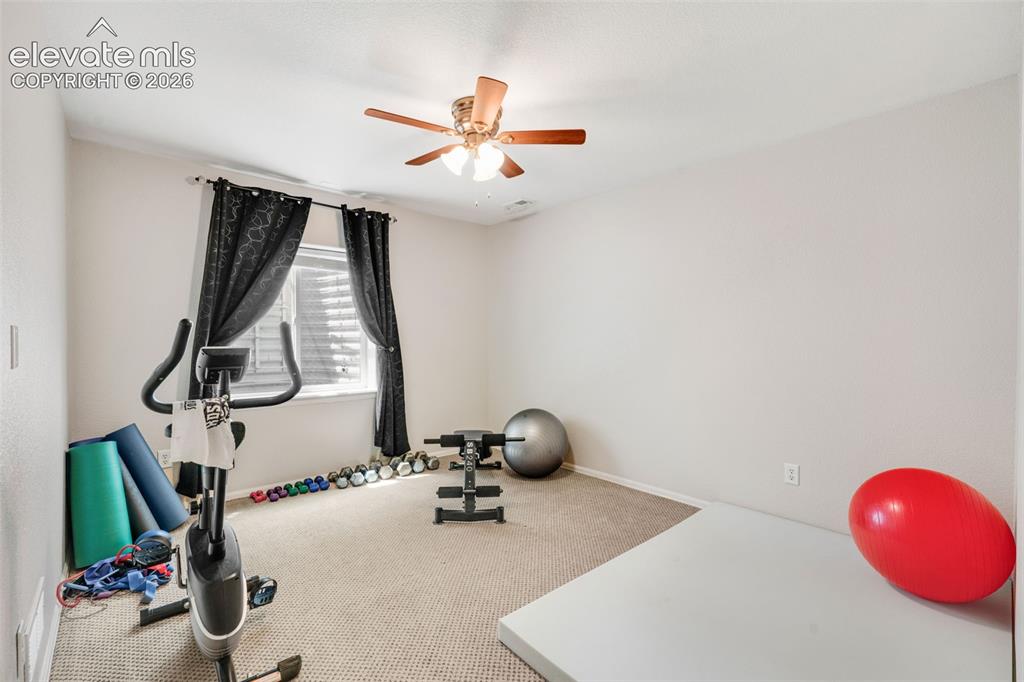 Image 29 of 46: Upper bedroom with large window, deep/long closet and oak flooring