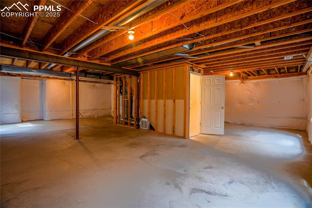 Image 30 of 37: View of unfinished below grade area.