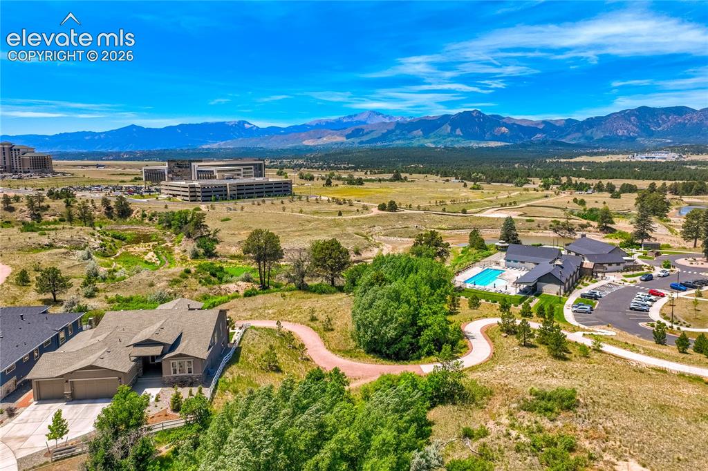 Image 3 of 50: Sweeping views of Pikes Peak, the Front Range, Air Force Academy, and prote