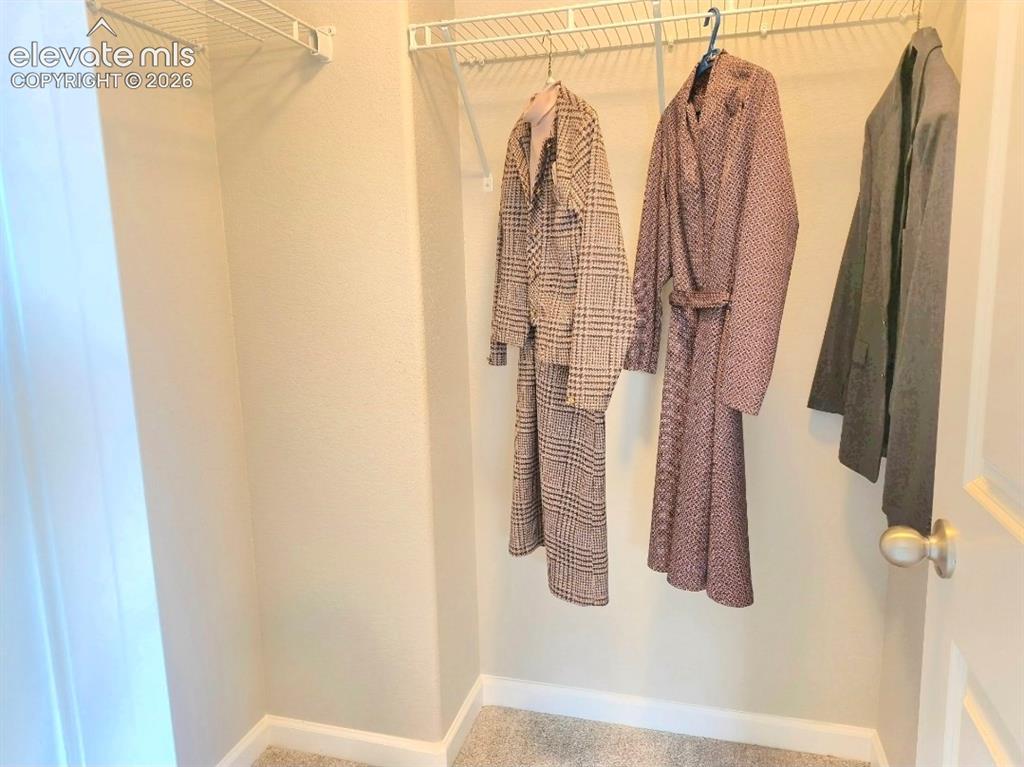 Image 16 of 35: master closet
