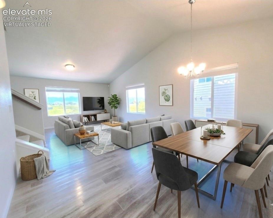 Image 4 of 35: virtually staged dining and living room