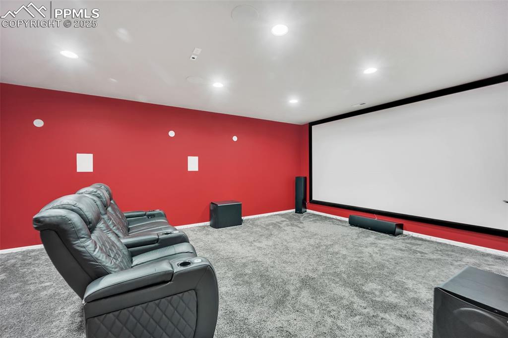 Image 26 of 45: Sound insulated theater with in-wall speakers and prewire for decorative wa