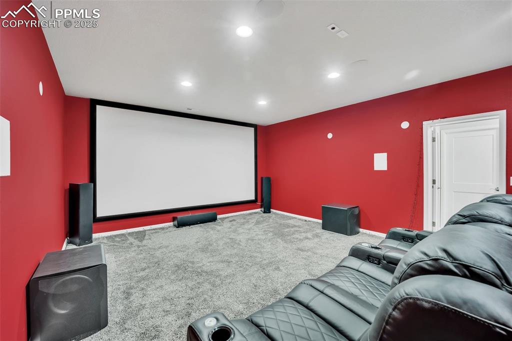 Image 27 of 45: Sound insulated theater with in-wall speakers and prewire for decorative wa