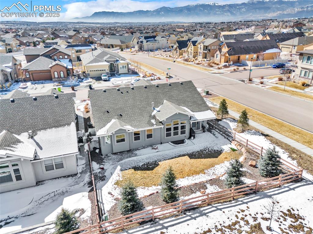 Image 41 of 45: Aerial view featuring a residential view and a mountain view